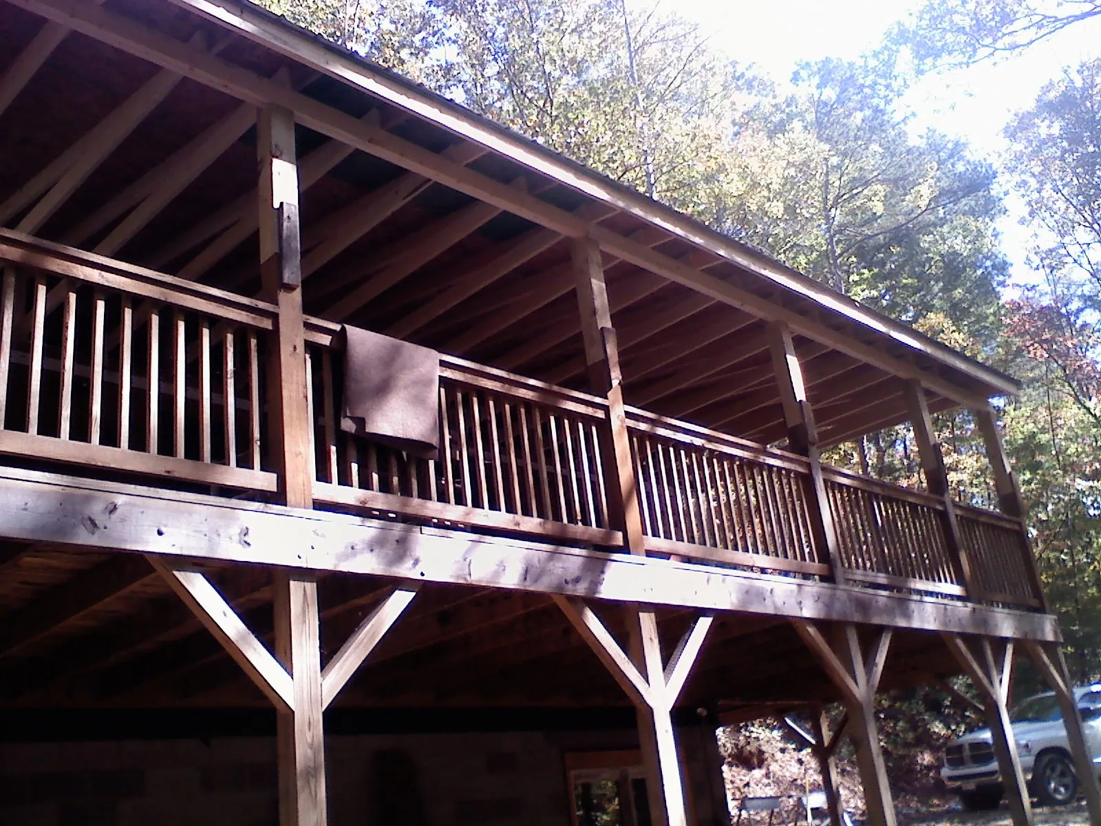 Timber framing under a new elevated porch and deck — Roof Leak Repair in Gibsonville by Roofing Brothers